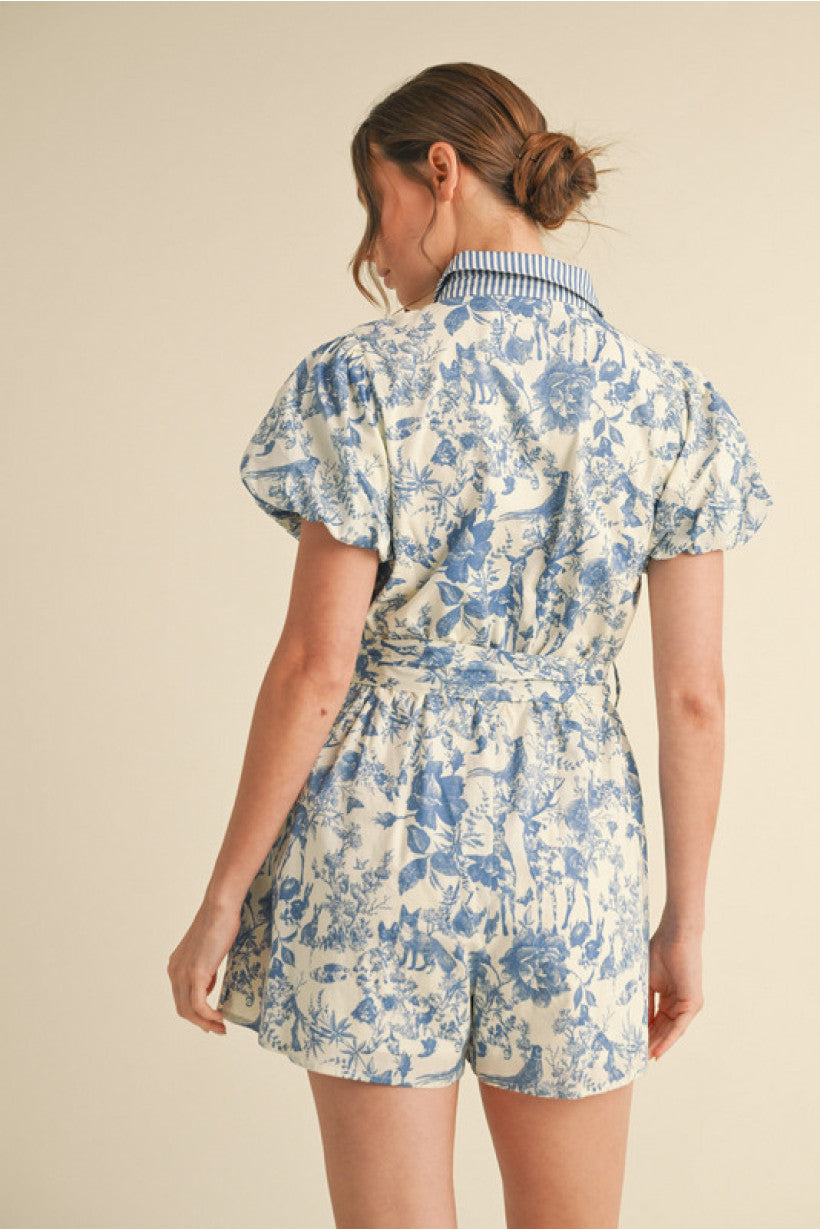 BLUE & WHITE FLORAL PRINT ROMPER W/BUTTONS DOWN FRONT