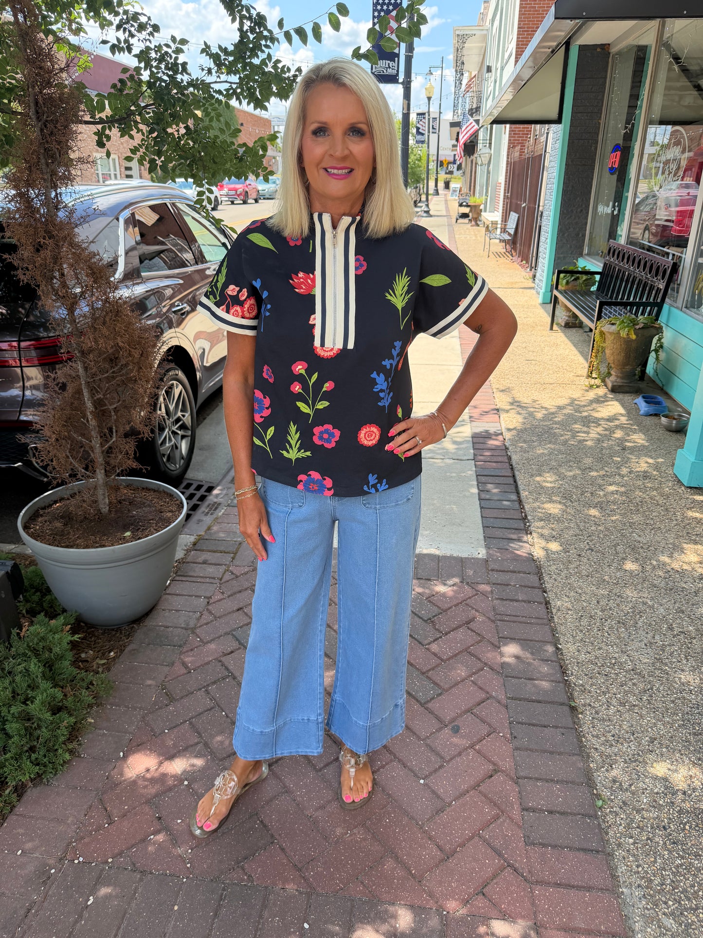 Drop shoulder front zip up floral top
