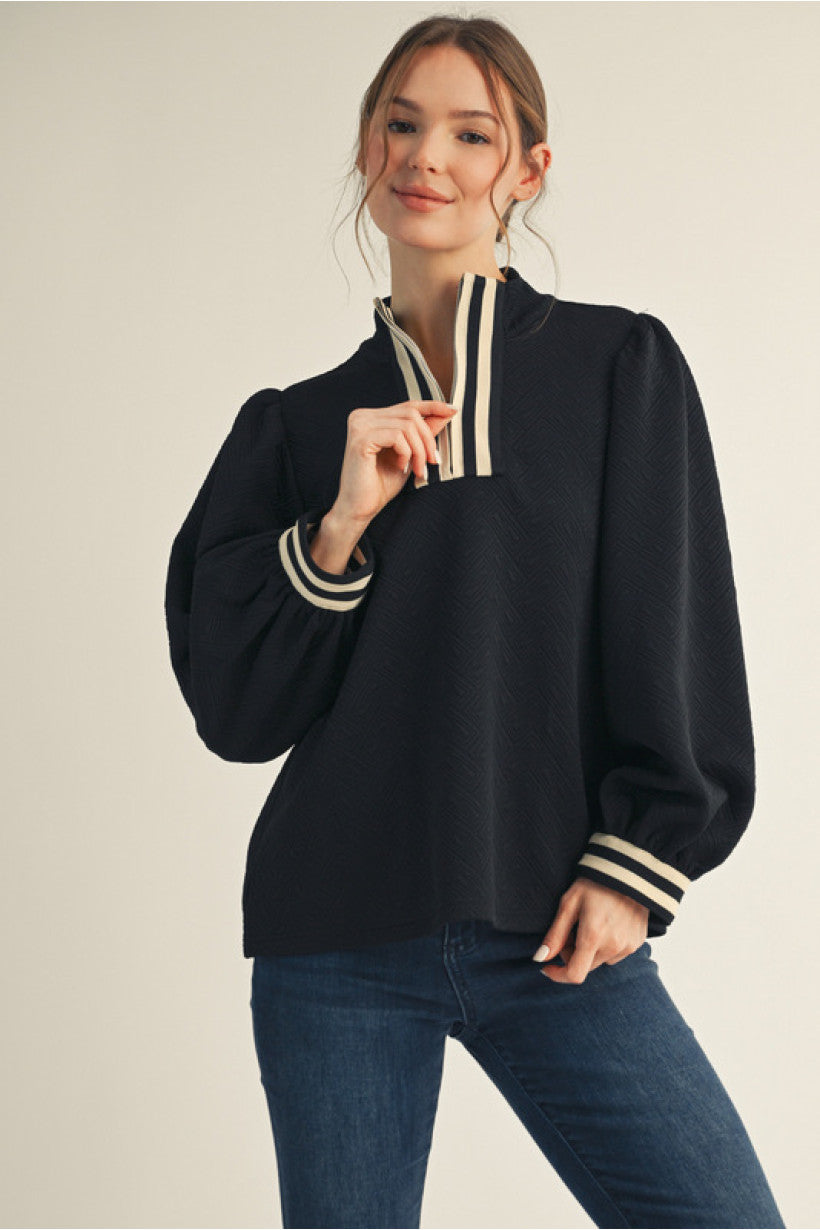 Long puff sleeves textured fabric.