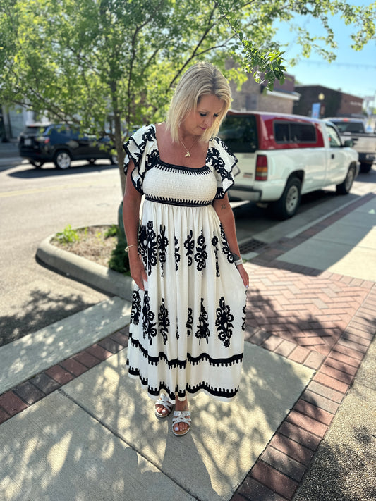 BLACK/CREAM SMOCKED RUFFLE SLV