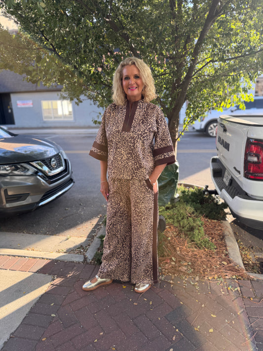Front zip up faux suede leopard top with solid contrast accent