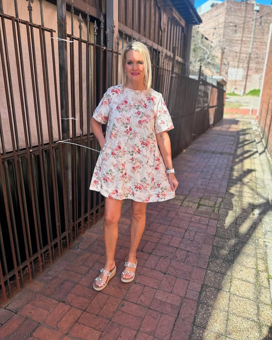 CREAM FLORAL SWING DR
